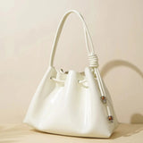 Friederike | Glänzende Handtasche mit Kordelzug