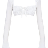 Dagny | Weißes Oberteil mit Puffärmeln und Minirock mit Schleife