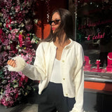 Manon | Strickjacke mit Knöpfen und Federärmeln