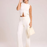 Gestricktes Cropped Top mit Knopfleiste – Minimalistisch, Weich & Kombistark