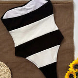 Schulterfreier Einteiler mit Kontraststreifen & High-Leg Cut