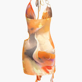 Mira | Asymmetrischer Seitenschlitz Neckholder-Minikleid mit Kunstdruck