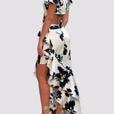 Asymmetrisches Wickelkleid – Maxikleid mit Blumenmuster & Volant-Saum