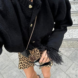 Manon | Strickjacke mit Knöpfen und Federärmeln