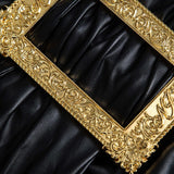 Lyra | Figurbetonter Kunstleder-Minirock mit asymmetrischer Drapierung und goldener Zierschnalle