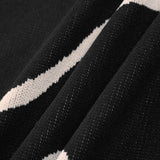 Maisie | Figurschmeichelndes Midikleid mit abstraktem Muster und zarten Spaghettiträgern