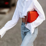 Cropped Damenbluse mit Raw Cut – Modern, Urban & Statementstark