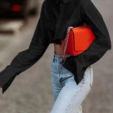 Cropped Damenbluse mit Raw Cut – Modern, Urban & Statementstark