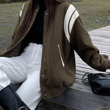 Molly | Lässige Varsity-Jacke im Retro-Stil mit gestreiften Ärmeldetails und gerippten Bündchen