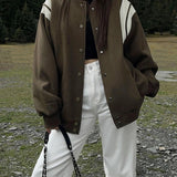 Molly | Lässige Varsity-Jacke im Retro-Stil mit gestreiften Ärmeldetails und gerippten Bündchen