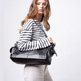 City-Handtasche mit Crossbody-Option und praktischen Fächern