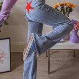 Flared Jeans mit Stern-Applikation – Hoher Bund & Vintage-Stil für Trend-Looks