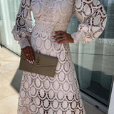 Elegantes Spitzenkleid mit Stehkragen & transparenten Details