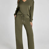 Damen Freizeitanzug mit Zipper-Pullover und weiter Hose