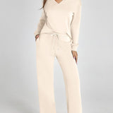 Damen Freizeitanzug mit Zipper-Pullover und weiter Hose