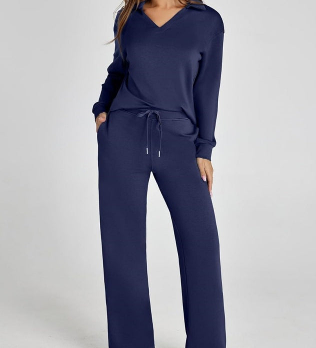 Damen Freizeitanzug mit Zipper-Pullover und weiter Hose