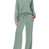 Damen Freizeitanzug mit Zipper-Pullover und weiter Hose