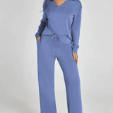 Damen Freizeitanzug mit Zipper-Pullover und weiter Hose