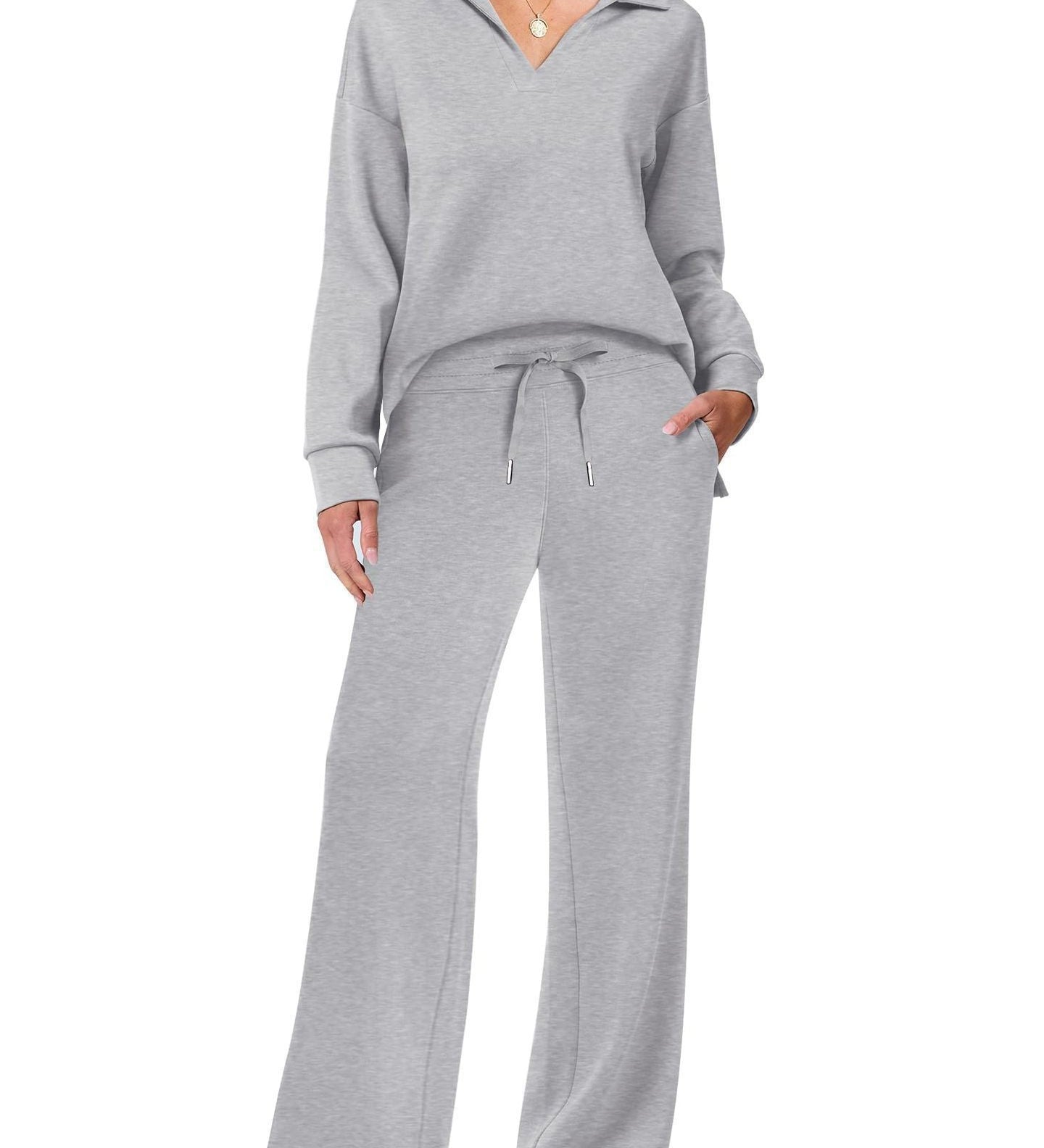 Damen Freizeitanzug mit Zipper-Pullover und weiter Hose