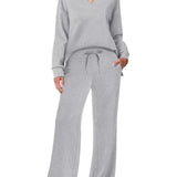 Damen Freizeitanzug mit Zipper-Pullover und weiter Hose