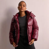 Damen Glanz-Pufferjacke Schwarz – Warme Steppjacke mit Kapuze