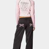 Trendige Wide-Leg Jeans mit verspielten Stickereien und modernem Schnitt