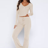 Laureen | Ausgestellter Jumpsuit mit langen Ärmeln