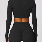 Livia | Langarm-Crop-Top mit Twist-Detail