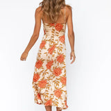 Satiniertes Midikleid – Sommerkleid mit Blumenmuster, Cut-Out & Spaghettiträgern