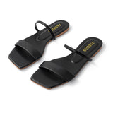 Stilvolle schwarze Sandalen mit minimalistischem Design