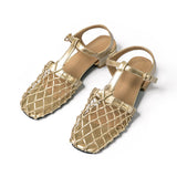 Elegante goldene Sandalen mit Netzdesign
