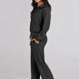 Damen Freizeitanzug mit Zipper-Pullover und weiter Hose