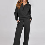 Damen Freizeitanzug mit Zipper-Pullover und weiter Hose