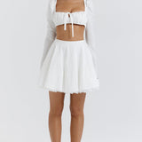 Dagny | Weißes Oberteil mit Puffärmeln und Minirock mit Schleife
