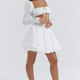 Dagny | Weißes Oberteil mit Puffärmeln und Minirock mit Schleife