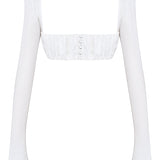 Dagny | Weißes Oberteil mit Puffärmeln und Minirock mit Schleife