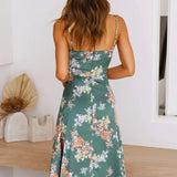 Satiniertes Midikleid – Sommerkleid mit Blumenmuster, Cut-Out & Spaghettiträgern